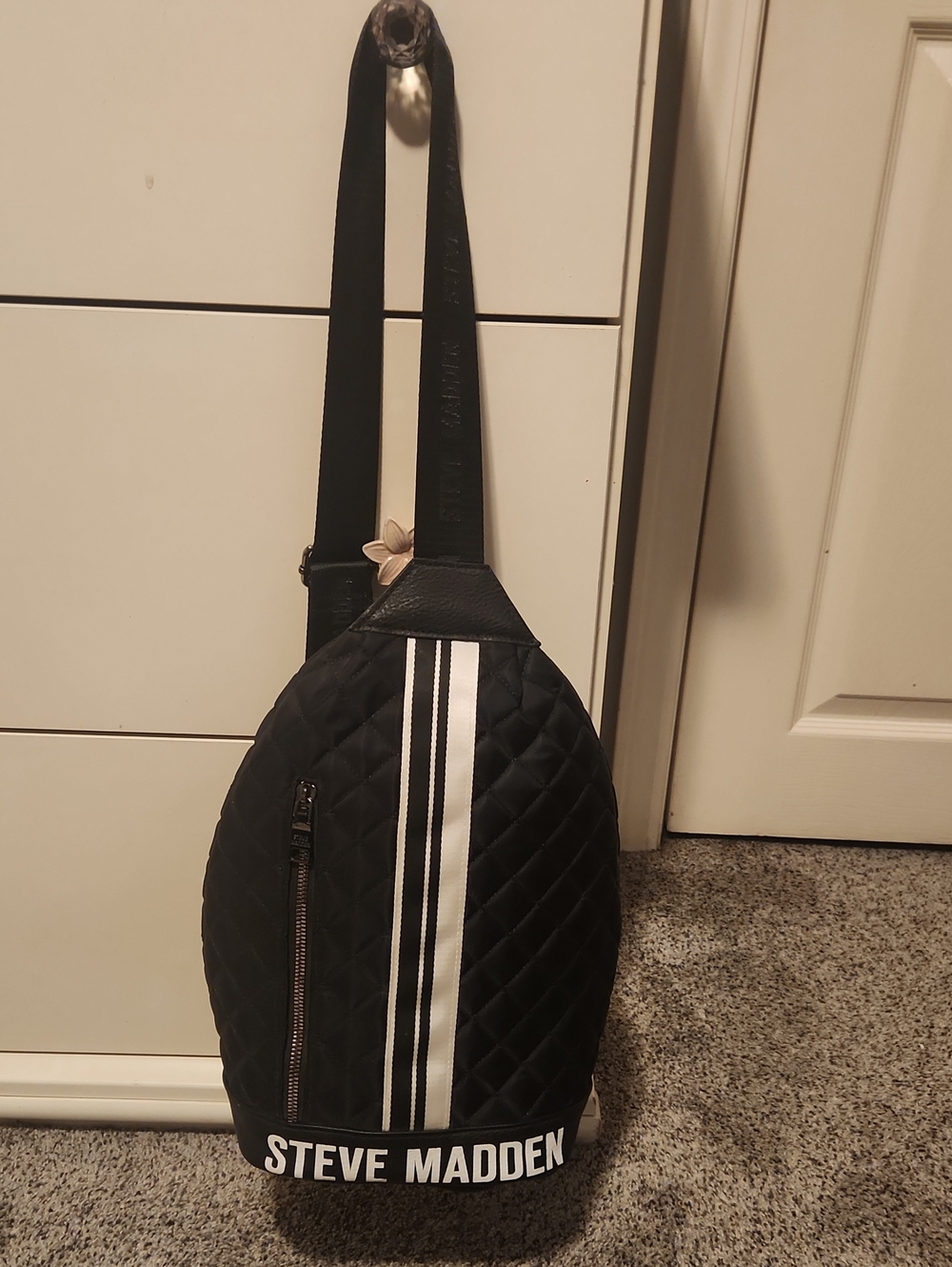 Steve Madden Black Quilted Sling Backpack with White Racing Stripe